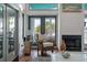 Living room seating area in front of fireplace and water view at 2619 Buccaneer Rd, Isle of Palms, SC 29451