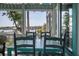Charming screened porch featuring beautiful water views and outdoor seating, perfect for entertaining at 2619 Buccaneer Rd, Isle of Palms, SC 29451