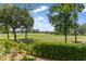 Scenic view of the golf course from the property's backyard at 27 Watroo Pt, Daniel Island, SC 29492