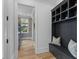 Hallway view with custom storage including bench and cubbies at 27 Watroo Pt, Daniel Island, SC 29492