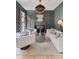Stylish living room with a fireplace, modern decor, and comfortable seating area at 27 Watroo Pt, Daniel Island, SC 29492