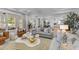 Bright and airy living room featuring stylish furniture and open floor plan at 27 Watroo Pt, Daniel Island, SC 29492