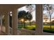 Scenic view from the porch overlooking a beautiful golf course, offering a serene and picturesque outdoor experience at 27 Watroo Pt, Daniel Island, SC 29492
