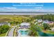 Stonoview community aerial view showcasing waterfront homes, a pool, and a serene coastal landscape at 2710 Mcfadden Way, Johns Island, SC 29455