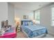 Charming bedroom with a bed, desk, and bright, natural lighting at 2710 Mcfadden Way, Johns Island, SC 29455