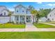 Charming two-story home with a well-manicured lawn and inviting curb appeal at 2710 Mcfadden Way, Johns Island, SC 29455