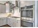 Well-equipped kitchen featuring stainless steel appliances, white subway tile, and ample cabinet space at 2710 Mcfadden Way, Johns Island, SC 29455