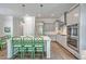 Modern kitchen with stainless steel appliances, a breakfast bar, and ample counter space for cooking at 2710 Mcfadden Way, Johns Island, SC 29455