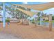 Community playground with a pirate ship theme, shade structure, and swings for outdoor fun at 2710 Mcfadden Way, Johns Island, SC 29455