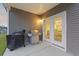 Outdoor patio featuring a gas grill and access to indoor living spaces at 286 W Bradford Pointe Dr, Summerville, SC 29486