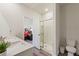 Bright bathroom featuring a double vanity, a glass-enclosed shower, and modern fixtures at 286 W Bradford Pointe Dr, Summerville, SC 29486