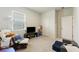 Bedroom featuring a TV, comfortable seating, and a view of natural light at 286 W Bradford Pointe Dr, Summerville, SC 29486