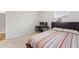 This bedroom features a comfortable bed and workspace bathed in natural light at 286 W Bradford Pointe Dr, Summerville, SC 29486