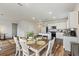 Open dining area with a view of the kitchen offers a comfortable space for meals at 286 W Bradford Pointe Dr, Summerville, SC 29486