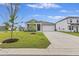 Charming single-story home with a well-maintained lawn and a two-car garage, perfect for families at 286 W Bradford Pointe Dr, Summerville, SC 29486