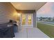 Enjoy outdoor cooking on this covered patio with grill, perfect for entertaining and dining at 286 W Bradford Pointe Dr, Summerville, SC 29486