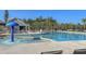 Beautiful community pool with a splash fountain and plenty of lounge seating at 286 W Bradford Pointe Dr, Summerville, SC 29486