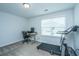 Bright bedroom featuring a work space and treadmill for exercise and convenience at 302 Fiddleback Dr, Summerville, SC 29486