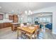 Open dining room featuring wood floors, a chandelier, and access to living areas at 302 Fiddleback Dr, Summerville, SC 29486