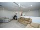 Open loft area featuring comfortable couches, a desk with computer, and a neutral color palette at 302 Fiddleback Dr, Summerville, SC 29486