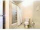 Bathroom with a shower-tub combination and a toilet; simple design with a white shower curtain at 3104 Mariners Way, Moncks Corner, SC 29461