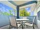 Outdoor patio with comfortable chairs, providing a perfect spot to enjoy the serene views and fresh air at 3104 Mariners Way, Moncks Corner, SC 29461