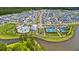 Aerial view of the community's amenities showcasing a pool, clubhouse, tennis courts, and landscaping at 312 Clearpath Dr, Summerville, SC 29486
