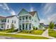 Beautiful two-story home with a double covered porch, showcasing outdoor living space at 312 Clearpath Dr, Summerville, SC 29486