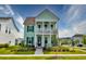 Attractive two-story home featuring a covered porch with a ceiling fan, perfect for relaxing at 312 Clearpath Dr, Summerville, SC 29486