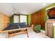 Fun game room with ping pong table, dart board, and bright, retro decor at 312 Clearpath Dr, Summerville, SC 29486