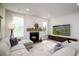 Inviting living room featuring a fireplace and comfortable seating arrangement at 312 Clearpath Dr, Summerville, SC 29486