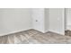 Carpeted bedroom with base trim, a large closet, and a door to another room at 3214 Pinewood Dr, Ladson, SC 29456