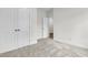 Bedroom with carpet, base trim, closet with double doors, and access to another room at 3214 Pinewood Dr, Ladson, SC 29456