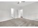 Bedroom with plush carpeting, ceiling fan, and doorway to bathroom at 3214 Pinewood Dr, Ladson, SC 29456