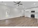 Open-concept area featuring the kitchen with stainless steel appliances and a large dining and living space at 3214 Pinewood Dr, Ladson, SC 29456