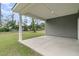 Covered back porch with a concrete floor, perfect for outdoor relaxation at 3218 Pinewood Dr, Ladson, SC 29456