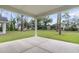 View from the back porch, showcasing a large, grassy backyard at 3218 Pinewood Dr, Ladson, SC 29456