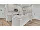 Bright and modern kitchen with stainless steel appliances, quartz countertops, and shaker cabinets at 3218 Pinewood Dr, Ladson, SC 29456