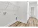 Functional laundry room with shelving and ample space for appliances and storage at 3218 Pinewood Dr, Ladson, SC 29456