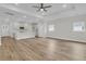 Expansive living room featuring neutral walls, recessed lighting, and hardwood-style flooring at 3218 Pinewood Dr, Ladson, SC 29456