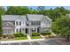 Aerial view showcases the townhouse with a gray roof, landscaping, and parking at 333 Flyway Rd, Goose Creek, SC 29445