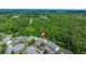 Aerial view of a residential community surrounded by lush greenery and nature at 333 Flyway Rd, Goose Creek, SC 29445