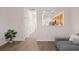 Open living area featuring a gray sofa and hardwood floors with a view of the kitchen at 333 Flyway Rd, Goose Creek, SC 29445