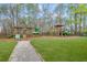 Fun playground area with slides and playhouses, ideal for children, located in the backyard at 333 Flyway Rd, Goose Creek, SC 29445