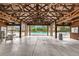 Spacious pool area under a covered structure, featuring tables, chairs, and a clear view of the refreshing pool at 333 Flyway Rd, Goose Creek, SC 29445