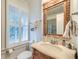 Close up of bathroom vanity and window with plantation shutters at 340 President St, Charleston, SC 29403