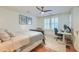 Bedroom with ceiling fan and hardwood floors can double as an office at 340 President St, Charleston, SC 29403