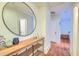 Hallway featuring hardwood floors, wood console and modern decor at 340 President St, Charleston, SC 29403