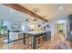 Spacious kitchen with a large island, seating, and stainless steel appliances with an open concept design at 340 President St, Charleston, SC 29403