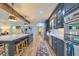 Open concept kitchen features a large island, stainless steel appliances, and classic cabinetry at 340 President St, Charleston, SC 29403
